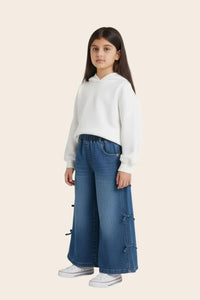 Girls flared denim jeans with side bow details from Denimden, suitable for ages 2 to 5 years, featuring stylish design and comfortable fit.