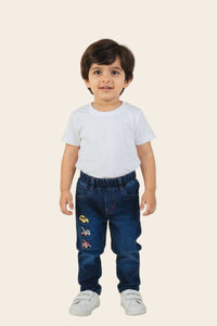 Boy's straight denim jeans with truck embroidery, size 1-3 years, classic style from Denimden, made of durable blue denim fabric.